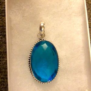 Silver plated blue quartz oval pendant
